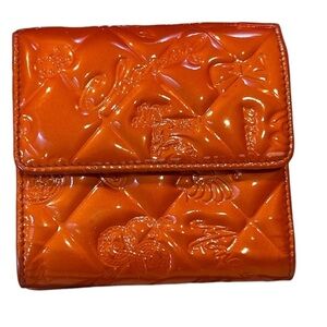 CHANEL Orange Quilted Lucky Charm Wallet